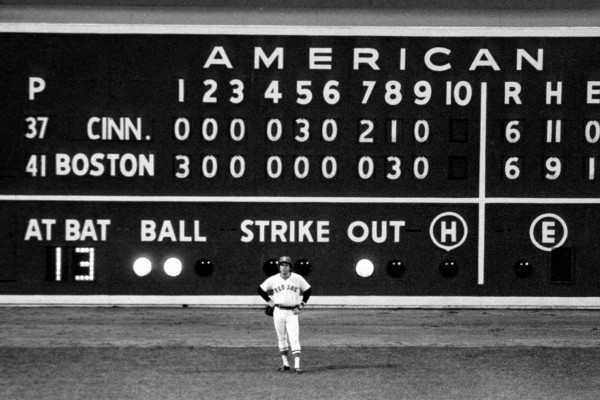 Carbo in front of scoreboard in '75